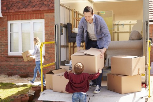 Team applying safe loading practices during a van move