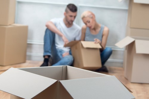 Removal team loading furniture and boxes for a local move