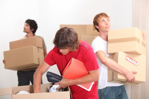 Moving crew using public liability insured van service in Upton