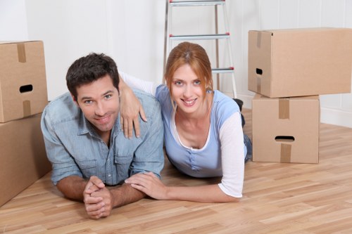 Packed boxes and furniture ready for loading during a Upton removal service