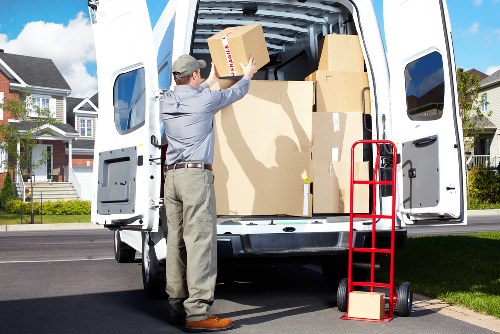 Local removal crew handling a household move with careful protection