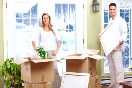 Professional packing service preparing fragile household items