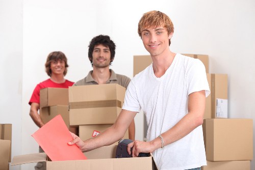 Professional movers handling furniture during a local Upton removal