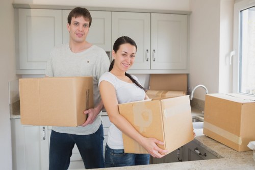 Commercial movers transporting office equipment in Upton